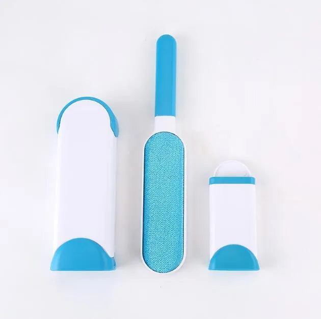Blue self-cleaning pet hair remover brush with double-sided roller next to its cleaning base.