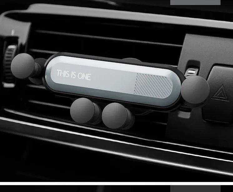Universal magnetic car phone holder mounted on vehicle air vent with adjustable ball joint