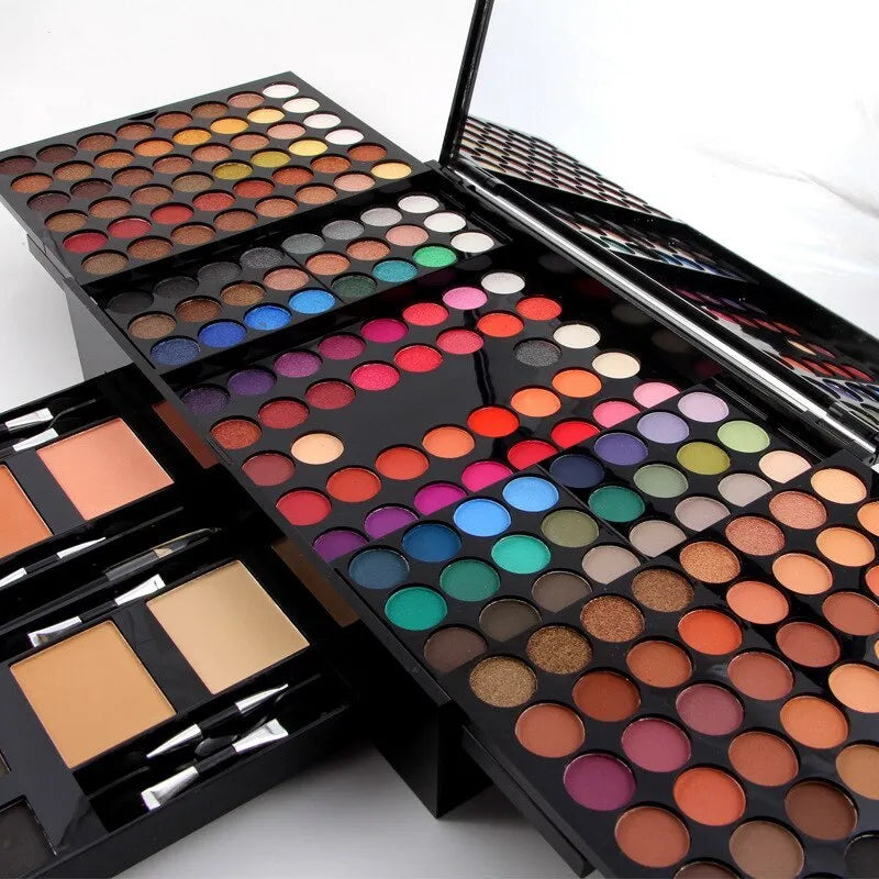 Open piano-shaped makeup palette showing rows of 190 coloured eyeshadow, blush, and powder pans