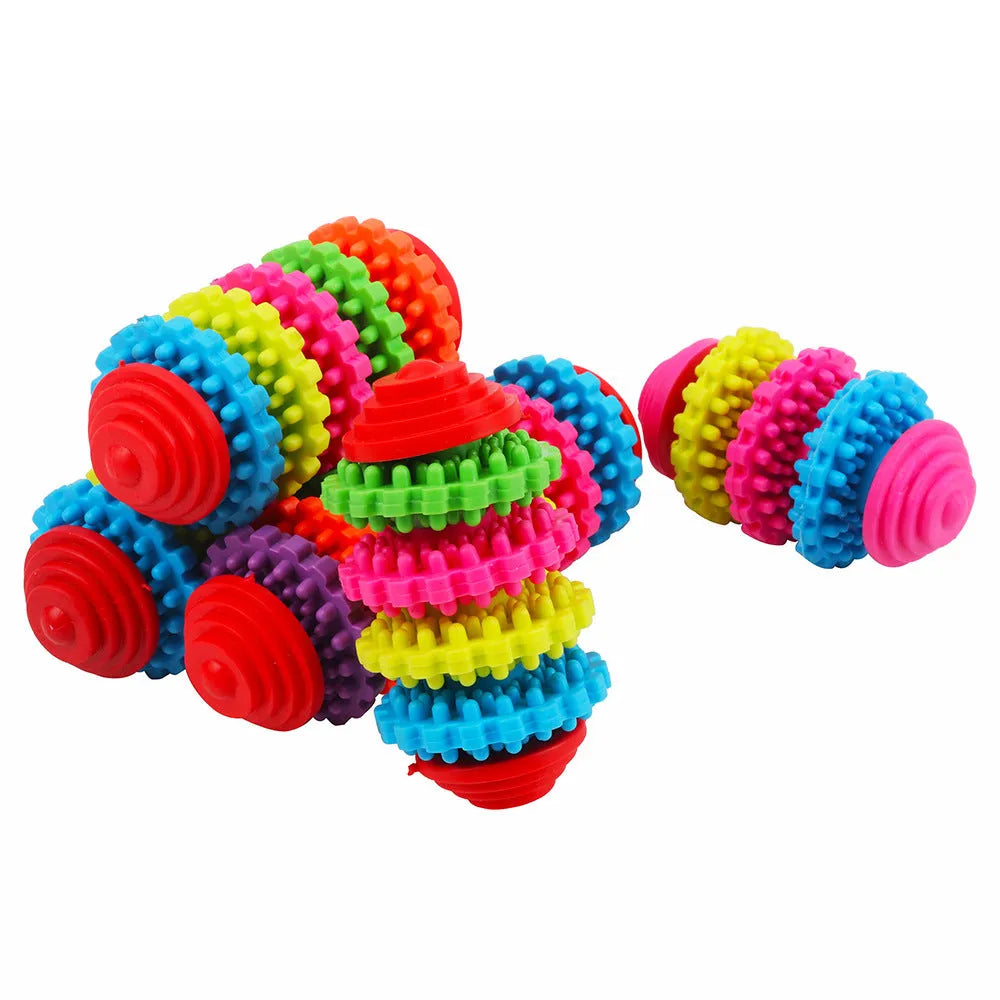 Colorful swivel TPR plastic seven-ring pagoda dog molar toy for teeth cleaning and play