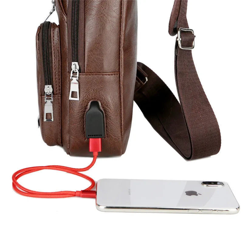 USB portable charging chest bag in PU leather with zipper closure, black colour, front pocket visible