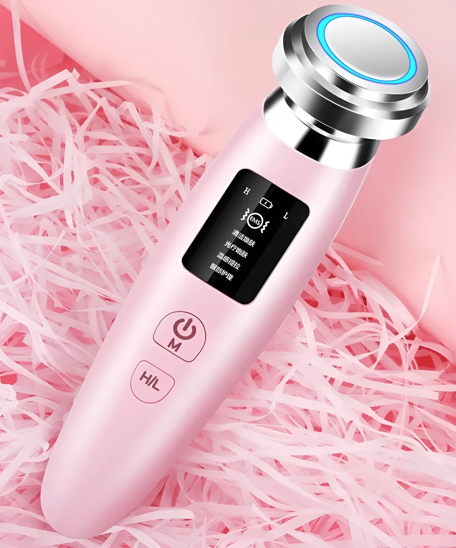 Pink cleansing and rejuvenating beauty instrument measuring 185mm long