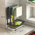 Foldable plastic kitchen draining rack in New Chinese style on a countertop