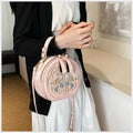 Soft PU Chinese embroidery messenger bag in horizontal square shape with adjustable shoulder strap.