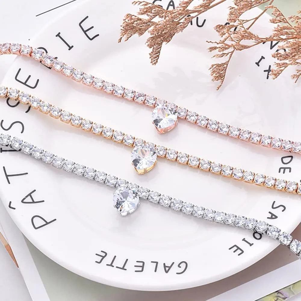 Gold rhinestone heart-shaped collar for dogs and cats on an extension chain.
