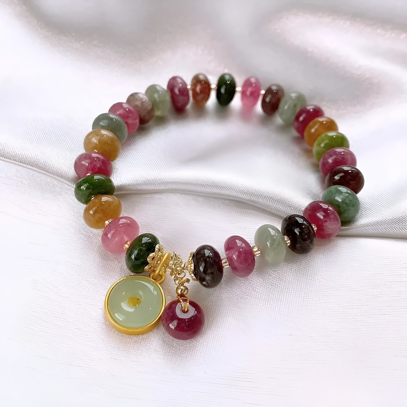Handmade natural stone bracelet with colourful tourmaline rabbit pendant and geometric round beads