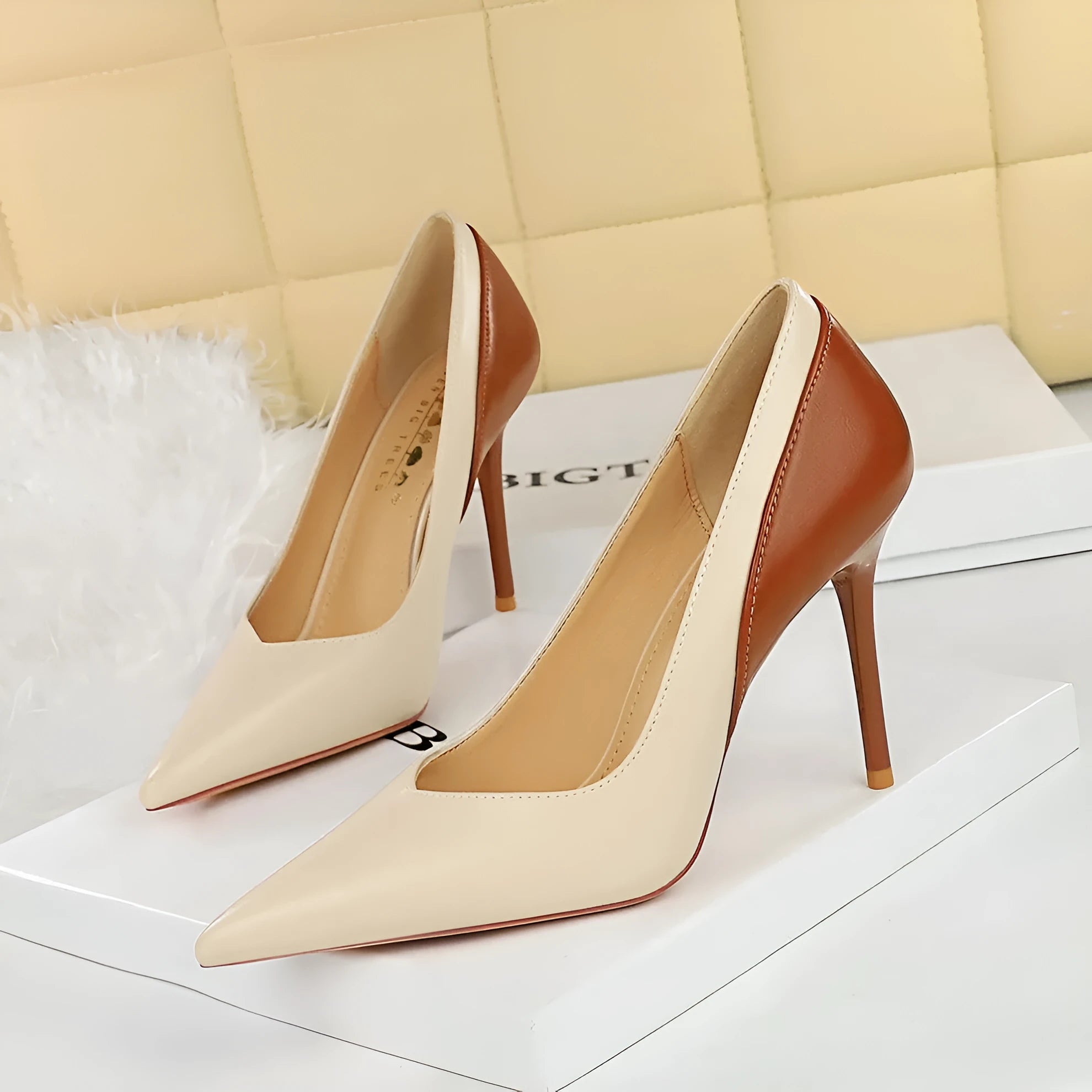 Retro women's black high heels with stiletto heels and pointed toes for banquet events