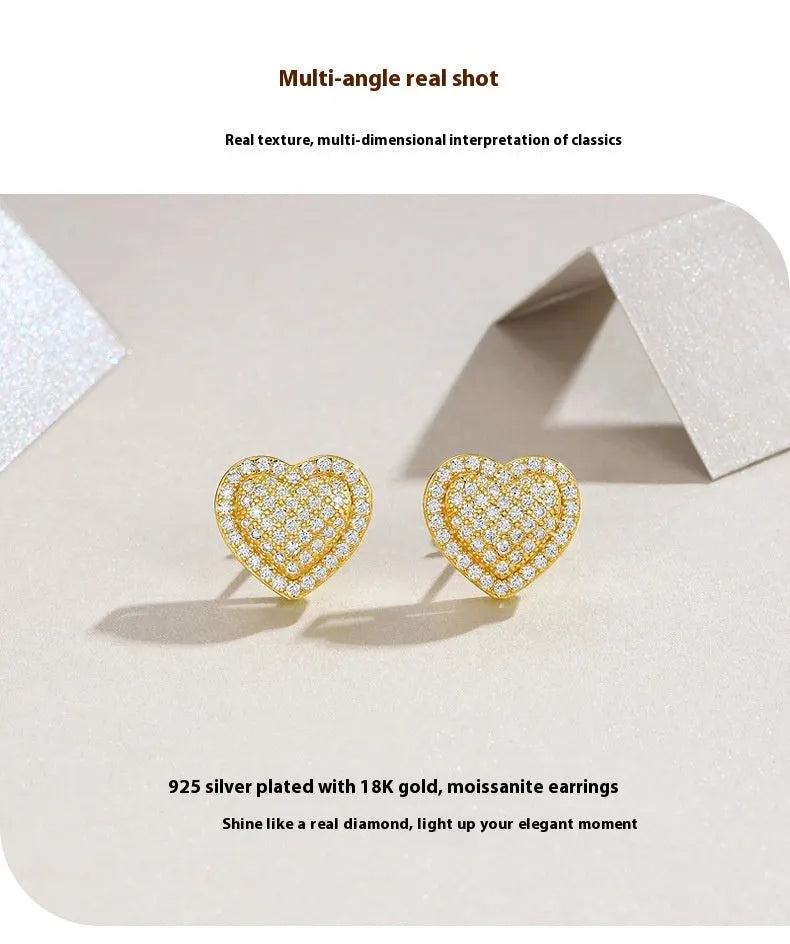 S925 silver heart-shaped stud earrings with moissanite stone in gold colour.