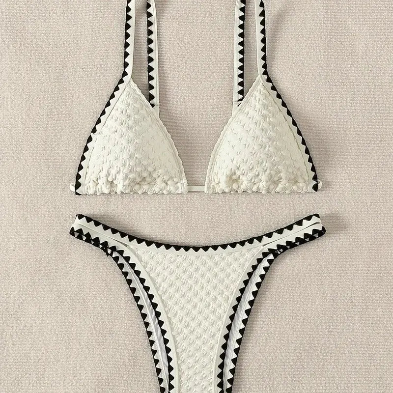 Women's two-piece split bikini swimsuit in white and blue colours with brief-style cut