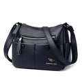 Soft PU leather women's crossbody bag in horizontal square design with multiple internal compartments