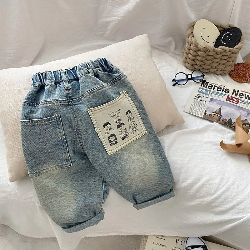 Light coloured boys casual denim jeans with elastic waist and personalised back pocket print