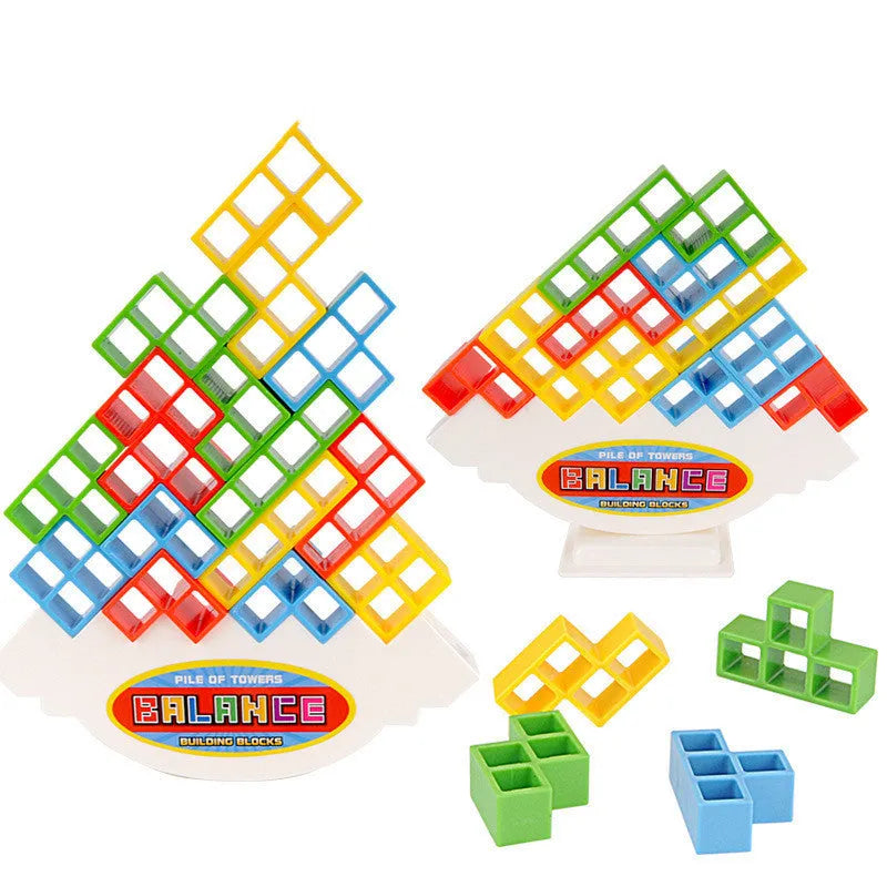 Plastic balance stacking game with coloured building blocks, chassis, and base on a table