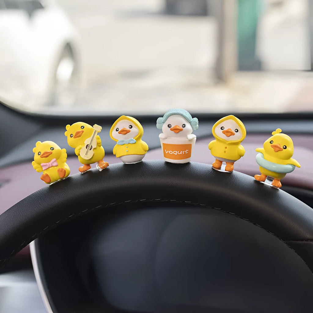 Yellow and white PVC cartoon duckling car decoration set with six small ducks and one welcome sign