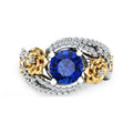 Flower rose two-tone copper ring for women with blue artificial gemstone on a white background