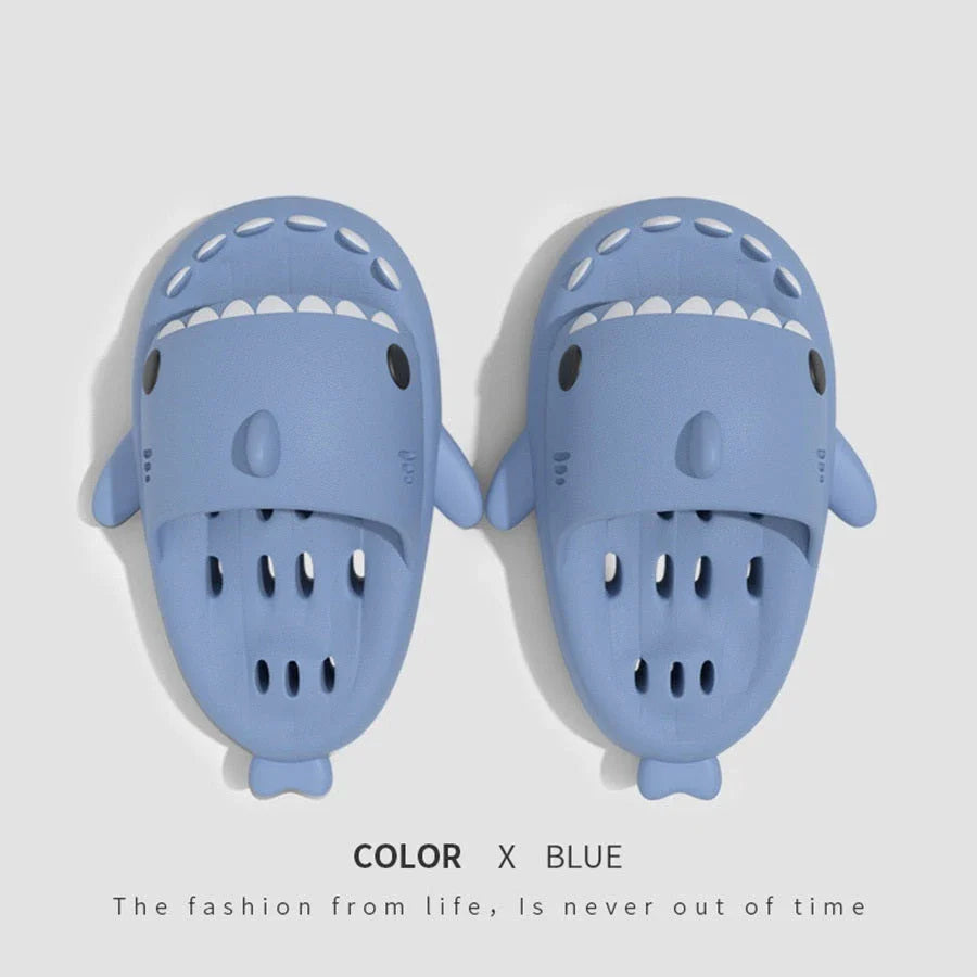 Shark-inspired shower slides with drain holes, featuring authentic shark design details and quick-drying EVA material