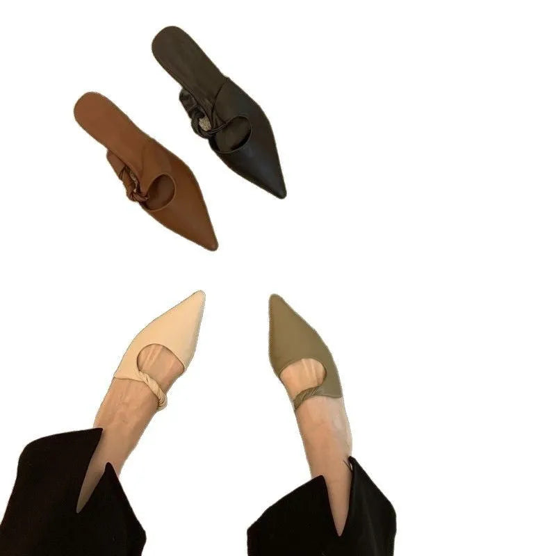 Women's soft leather slippers in dark brown with a semi-toe box design and rubber sole.