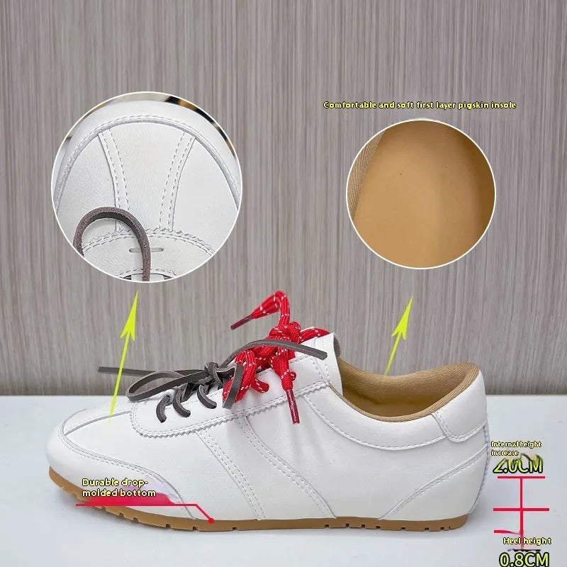 Women's white casual lace-up shoes with horsehair flocked detailing on leather upper, flat heel and round toe.