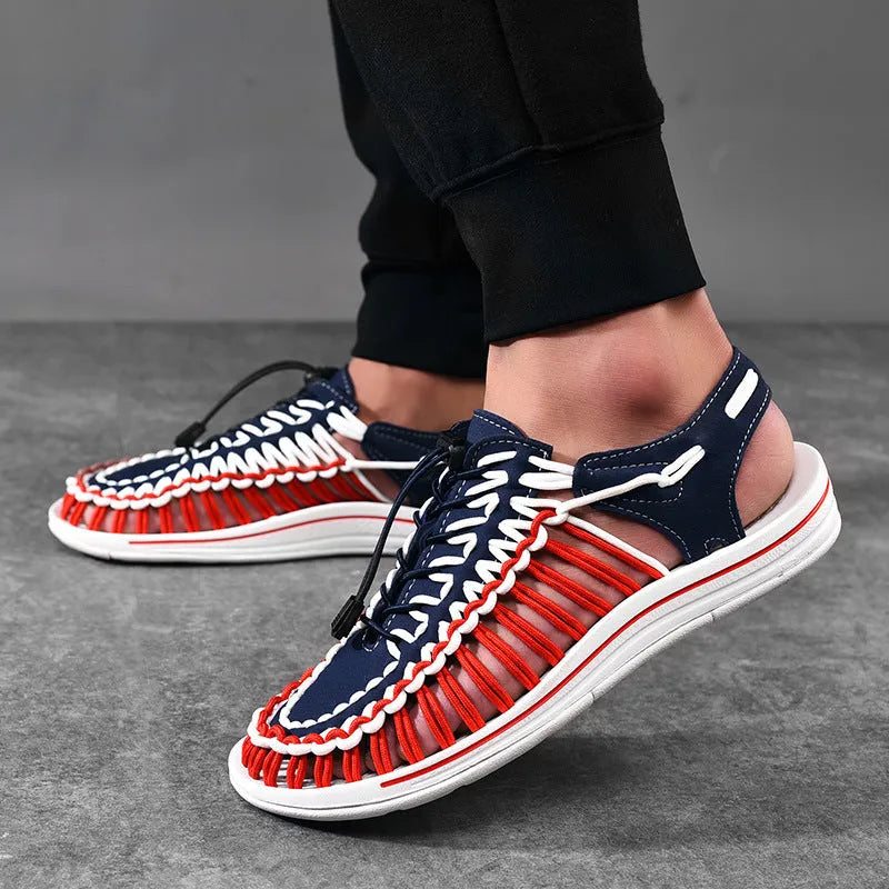 Adjustable drawstring tie woven sandals in multiple colours on a non-slip rubber sole.