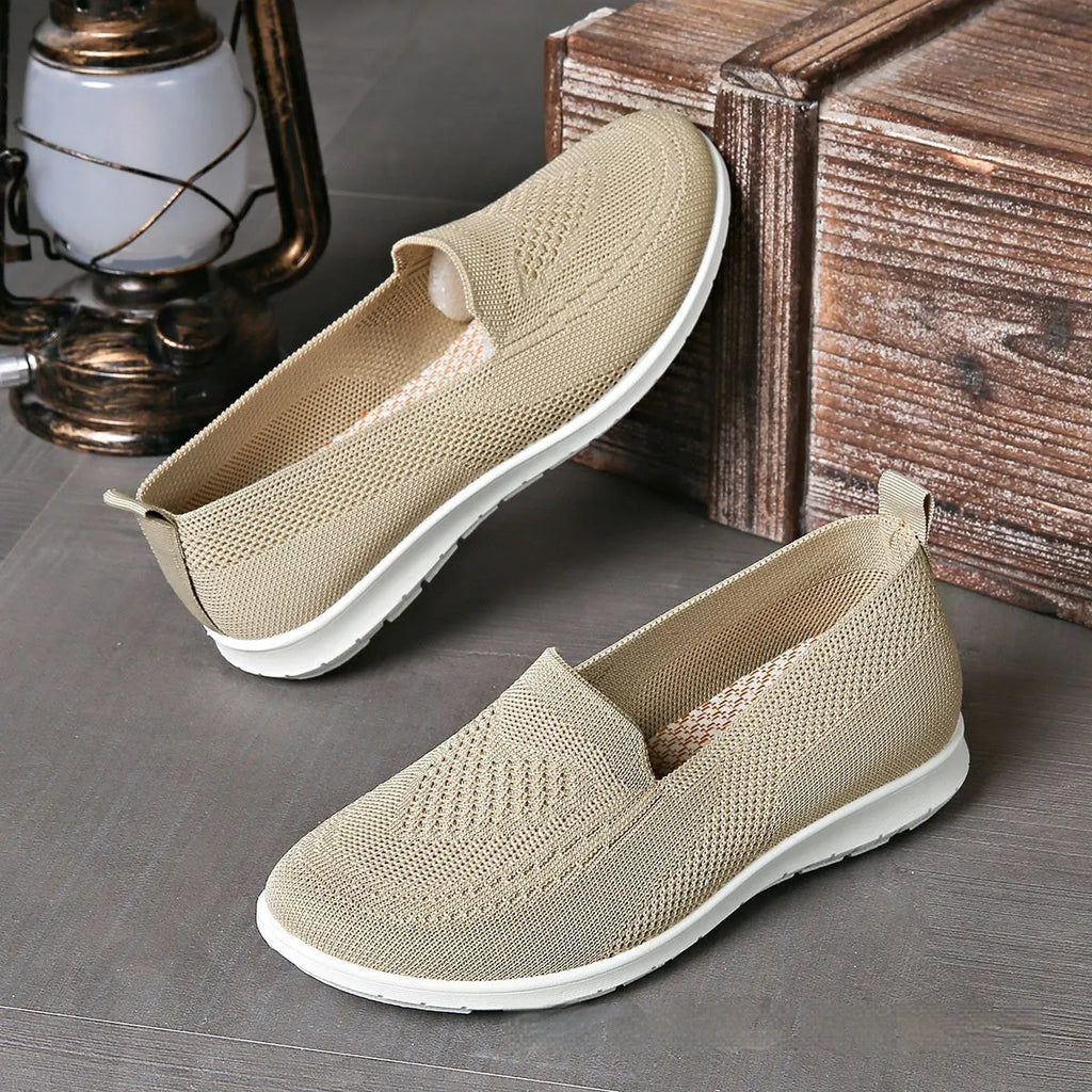 Women's low-top cloth casual shoes with heart pattern detail and mesh lining in multiple colour options