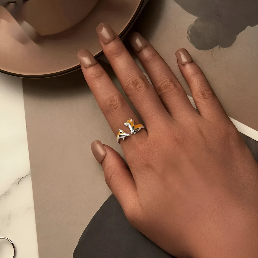 Silver electroplated cartoon corgi fashion ring for women on a white background.