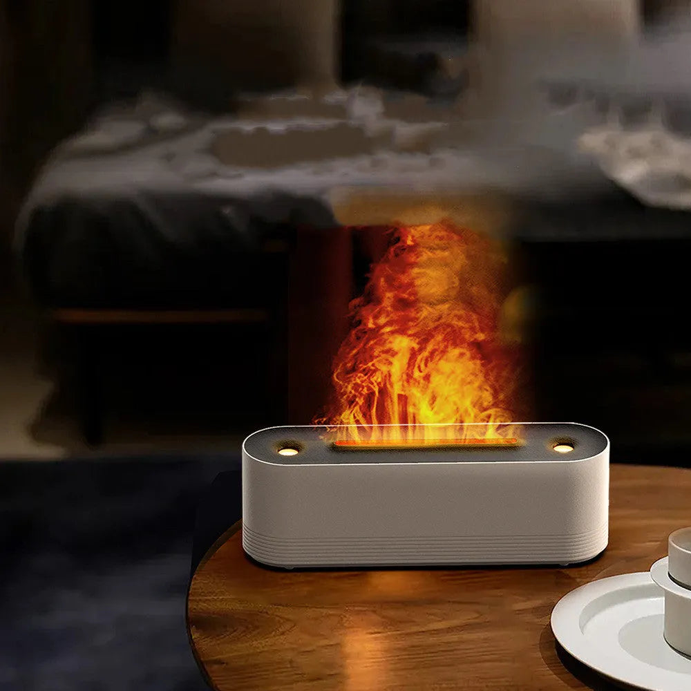 Black or white ultrasonic aroma diffuser with 7 colour LED flame lighting and cool mist output