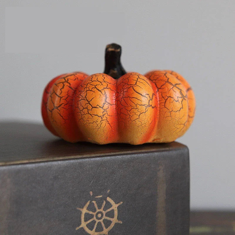 Enchanting resin pumpkin lanterns with realistic textures and LED candle illumination for Halloween decor and celebrations