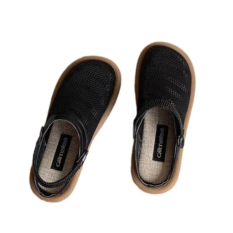 Beige linen slip-on shoes with mesh lining and a light rubber sole on a neutral background.