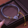 Grey retro style women's bracelet made from smoke purple agate with a ring buckle fastening.