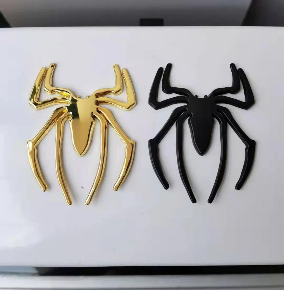 Gold zinc alloy metal bumper sticker with 3D embossed spider design