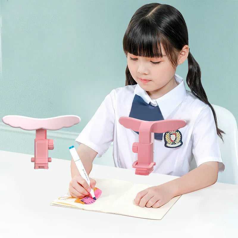 Student anti-myopia seated posture orthosis in silicone and ABS, blue or pink, card table and desktop model