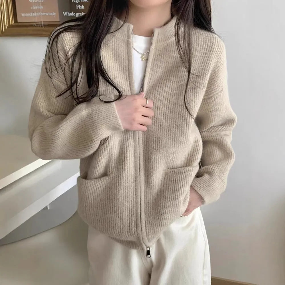 Beige long sleeve cardigan-style sweater coat made from soft viscose fibre fabric.