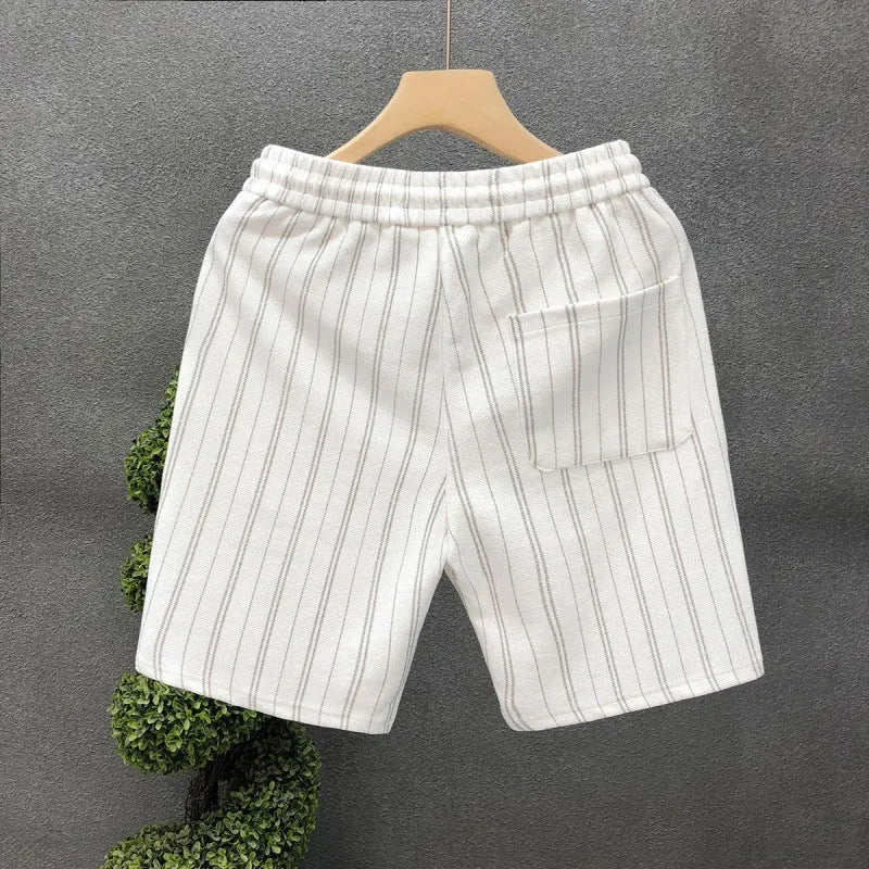 Men's black and white striped fleece-lined casual shorts with elastic waistband