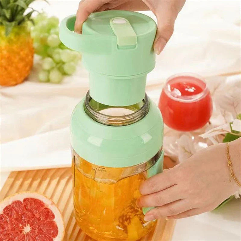 Portable USB rechargeable juicer blender with 50 oz capacity, precision steel blades, and double handles for easy use