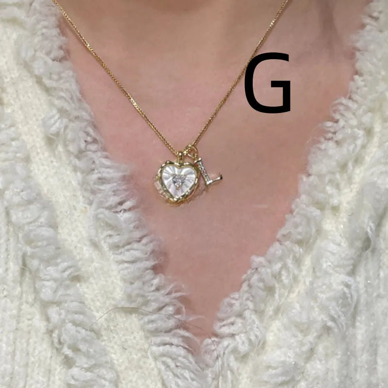 Titanium steel necklace with natural mother-of-pearl inlay, heart or geometric pendant, regular chain, initial A-M.