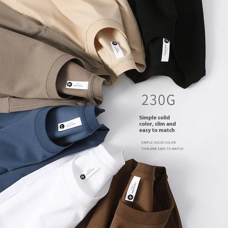 Heavyweight cotton blend T-shirt in drop shoulder design showing loose fit and round neck in multiple colour options
