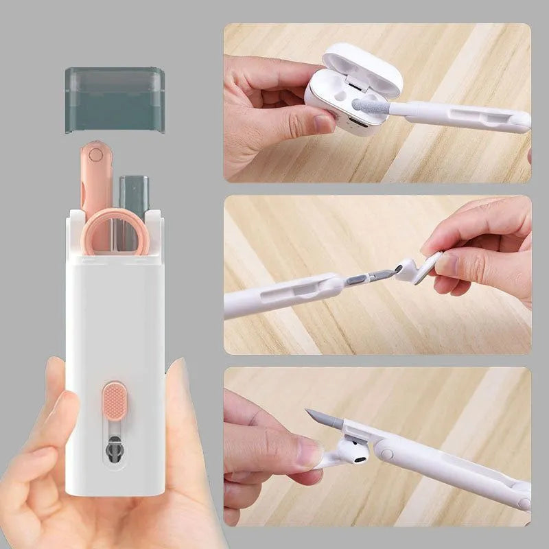 Multifunction electronics cleaning kit with foldable pen, spray bottle, brush, and keycap puller on a white background.