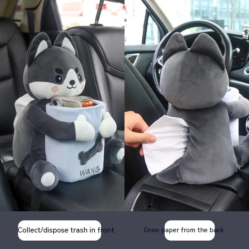 Plush car tissue box holder hanging in flip armrest compartment with dog character design