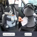 Plush car tissue box holder hanging in flip armrest compartment with dog character design