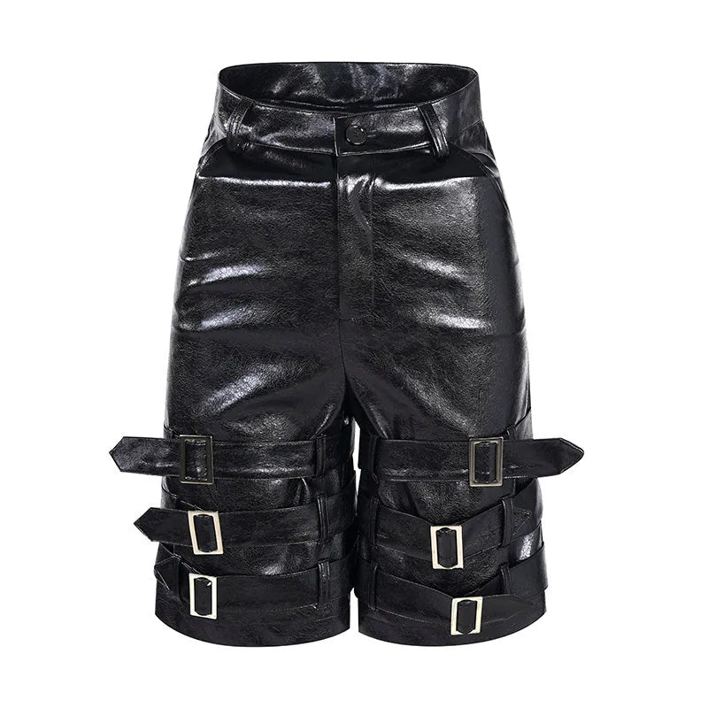 Black men's PU leather cropped shorts with leather ring detailing on a model