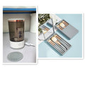 Grey and white portable electric makeup brush cleaner with USB charging cable