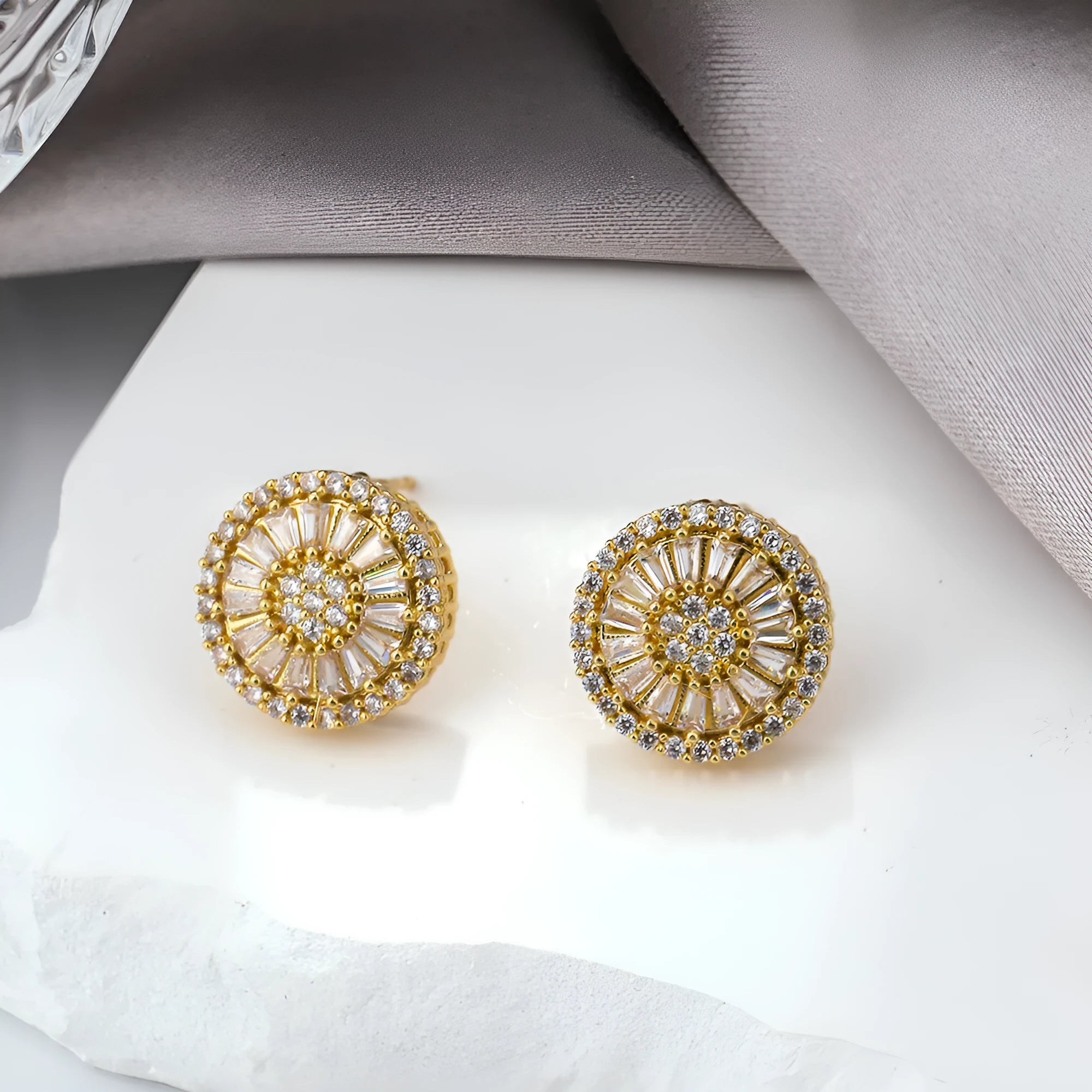Round geometric copper earrings with electroplated gold finish and pattern design