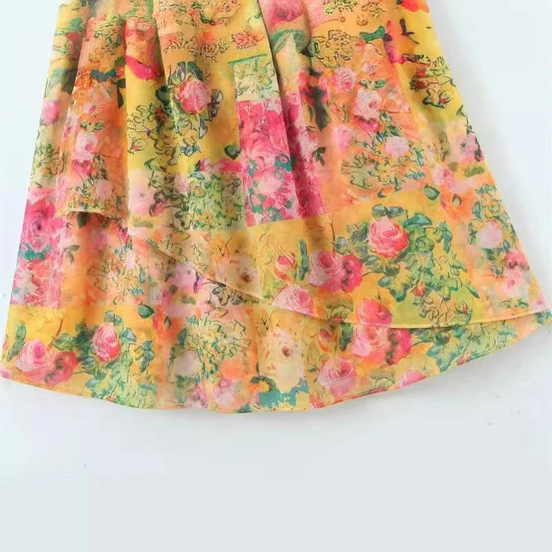 Elegant floral suspender dress with ruffled design, perfect for summer fashion