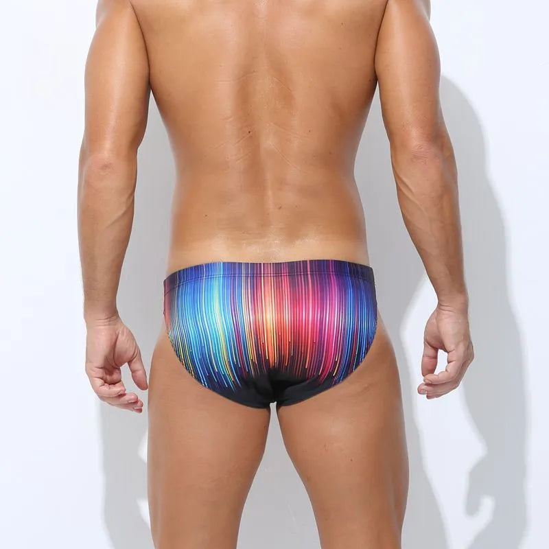 Men's printed polyester swimming trunks in a choice of four designs: Cyber, Ice Cream, Streamer, or Skull.