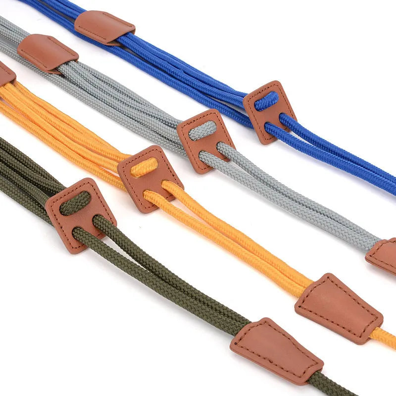 Chest-back dog leash in monochrome design, 143cm long, made from synthetic silk nylon rope and cowhide, in grey.
