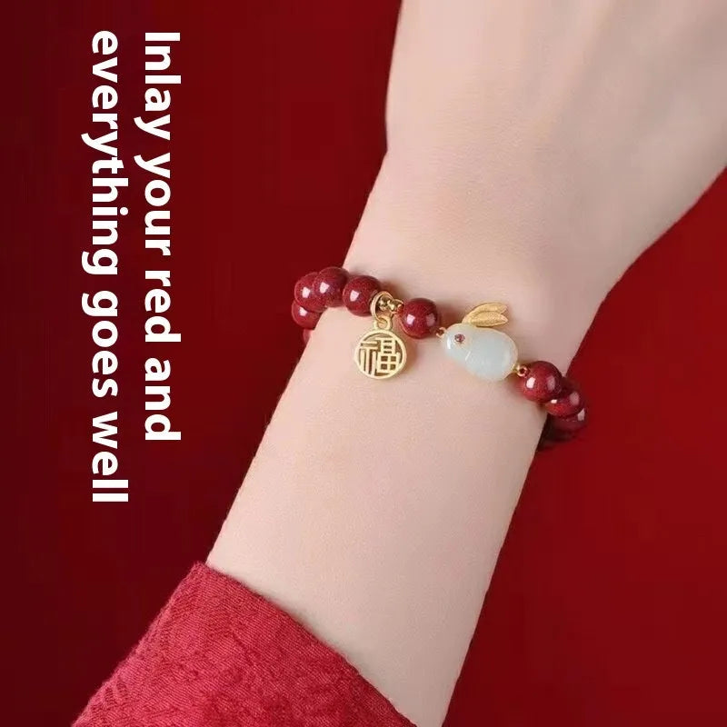 Purple Gold Sand cinnabar bracelet with hare motif in 6mm or 8mm bead sizes