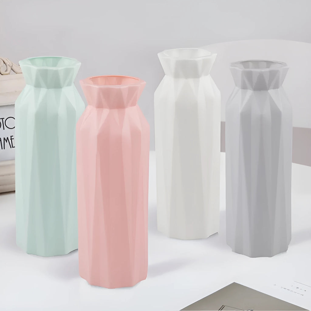 Simple green melamine plastic vase with a 7.2cm base diameter on a wooden table.
