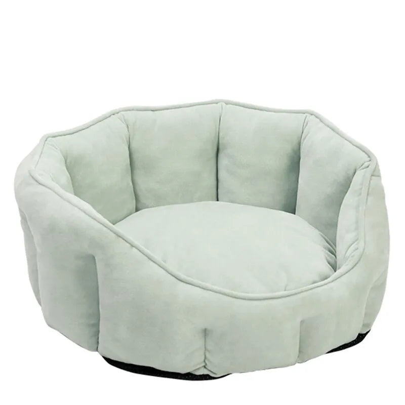 Grey plush cat kennel mat showing enclosed design with raised sides and soft interior.