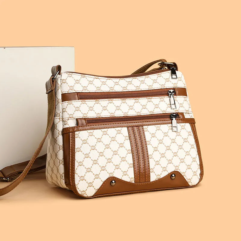 Brown and white large women's crossbody bag with stitching pattern detail
