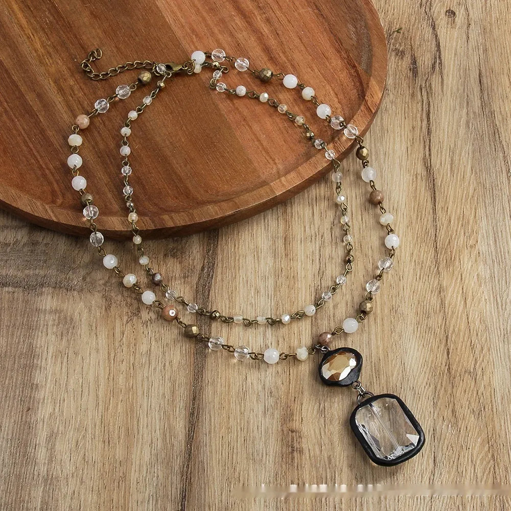 Tribal style necklace with glass stone pendant on two-layer adjustable chain