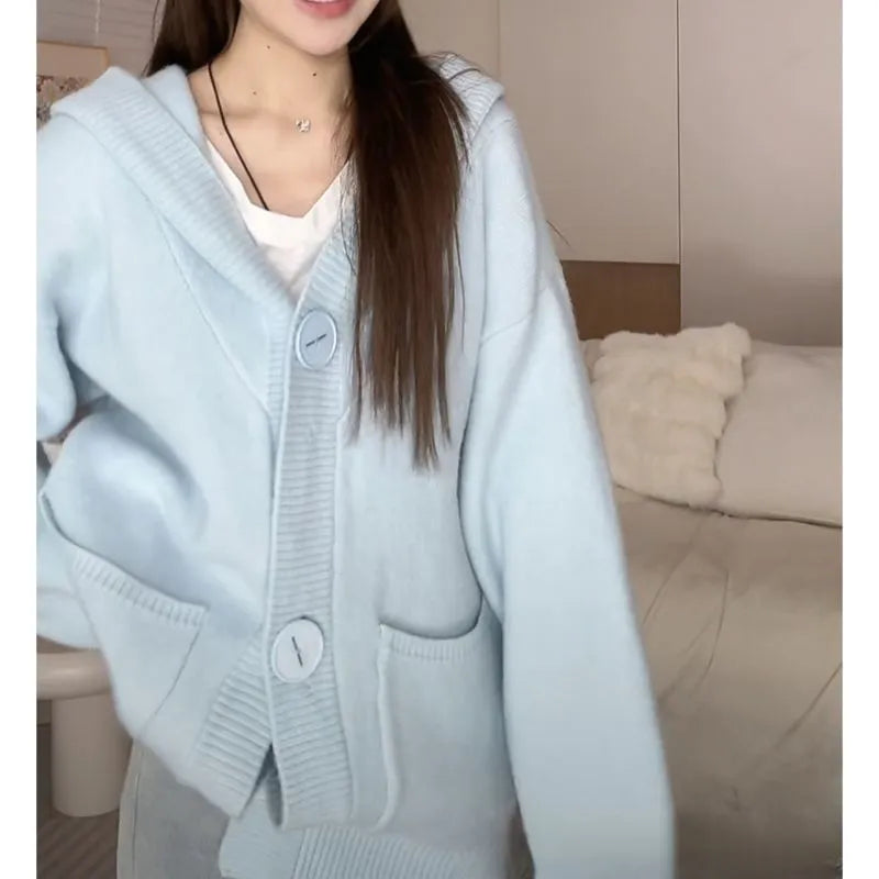 Sleeveless Ice Silk knitted cardigan with princess sleeves and button front, shown in available colours and sizes S to 2XL.
